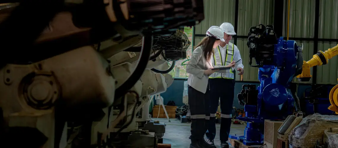 Professional valuer inspecting machinery for plant and equipment valuation in NSW